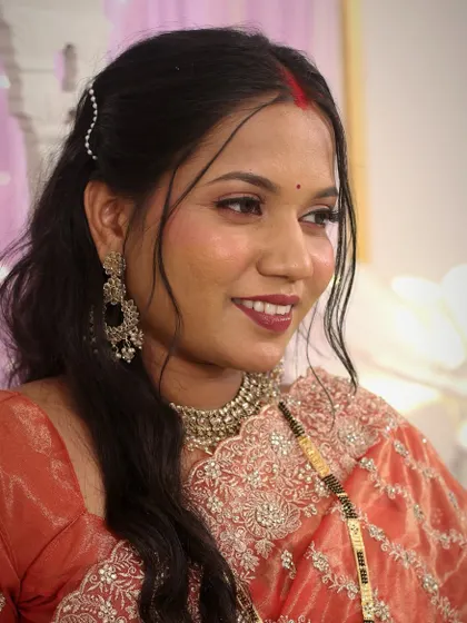 Another beautiful shot of Mrunali's reception look, highlighting the soft, blended makeup that gives her a natural radiance.