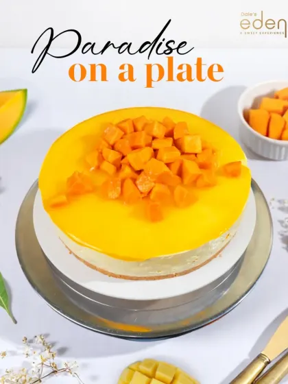 Paradise on a plate. Our classic Mango Cheesecake features a creamy base and is topped with a vibrant mango glaze and fresh, diced fruit.