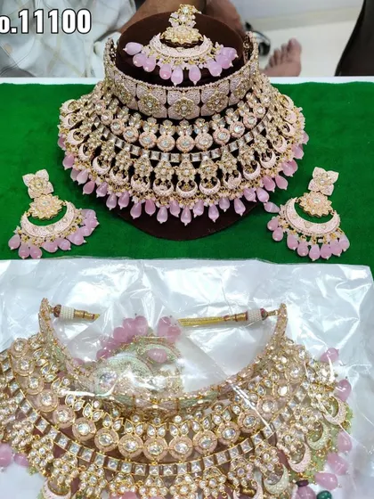 A collage of two different grand pink choker sets. These are statement rental pieces perfect for a bride's reception or a close family member.