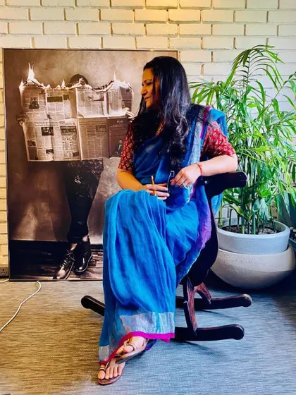 Wrapped in tradition and pride. Our founder, Rachna Agarwal, takes a moment in the studio, reflecting the blend of contemporary design and cultural heritage that influences our work.