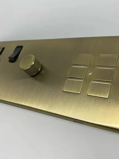 For clients who want fully custom solutions, I can design and install bespoke switch panels like this one from Rako. It combines smart scene buttons, a dimmer, and a standard socket in a single, elegant brass plate.