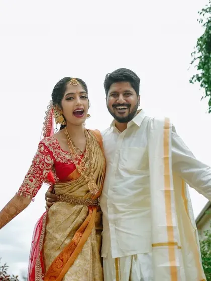 A duplicate of 128, a fun and expressive photo of the happy couple.