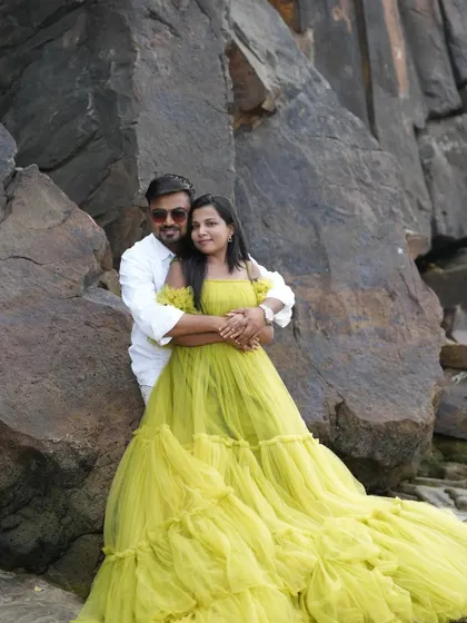 Another beautiful shot of the couple with the yellow gown, perfect for creating lasting pre-wedding memories.