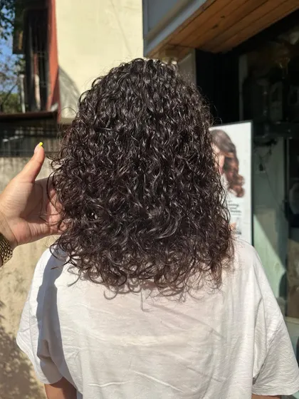 Another look at these gorgeous, healthy permed curls. My focus is on creating natural-looking texture and volume that you can easily manage at home.