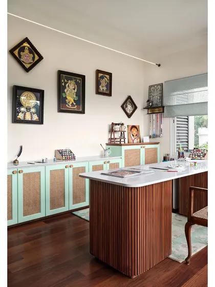 Another view of the studio, showing the ample storage and well-lit workspace designed to fuel creativity.