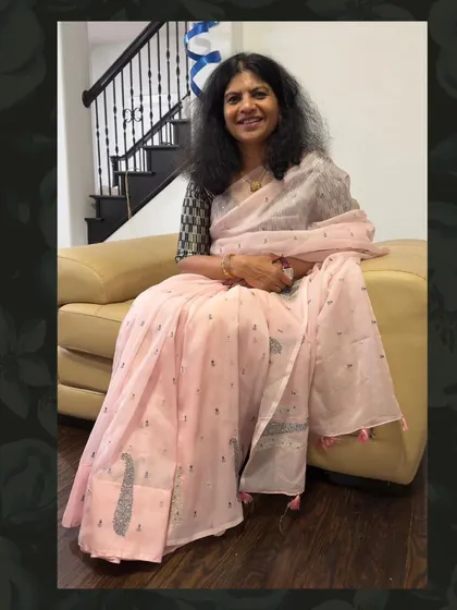 Sumana in a lovely light pink saree, showcasing a softer, more delicate option from our diverse collection.