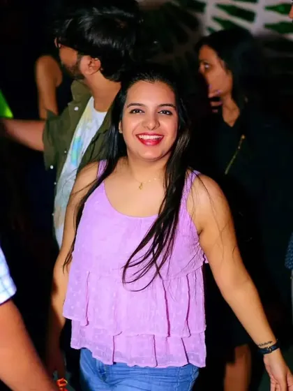 A happy smile from the dance floor. This is the positive energy that I aim to create and share at every event.