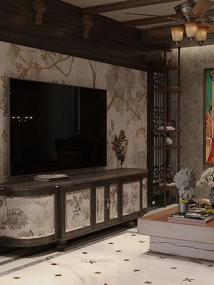 This angle focuses on the TV unit, which is designed to look like a classic painted console. It blends seamlessly with the maximalist theme, combining function with artistic, heritage-inspired furniture.