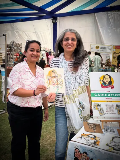 Posing with a happy customer at my stall during a lively outdoor mela.