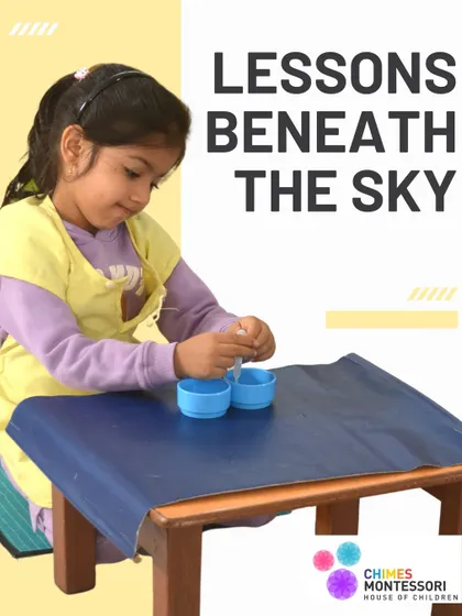 Lessons beneath the sky. A child works on a practical life activity, showing that learning can happen anywhere.