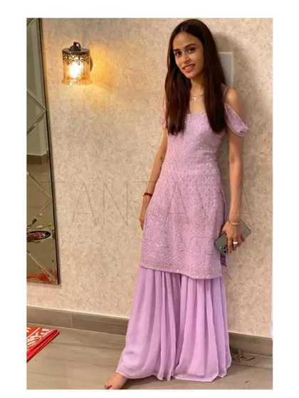 A final look at this custom sharara set, a perfect blend of modern trends and traditional embroidery.