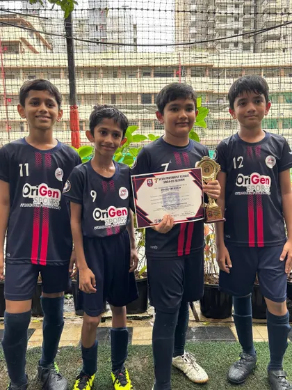 Aditya with his teammates after receiving the Player of the Match award. Even in a tough game, individual effort and team support shine through.