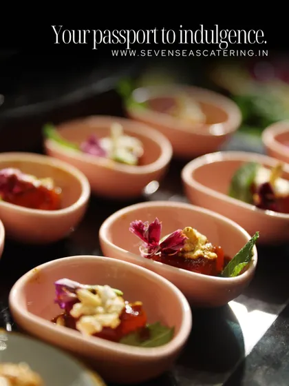 "Your passport to indulgence." This graphic features our beautifully crafted canapés in individual pink bowls, promising a journey of exquisite flavours.