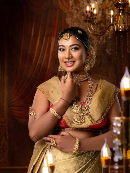 This student's work captures a joyful moment, with the lighting beautifully highlighting the glowing skin and gold jewelry.
