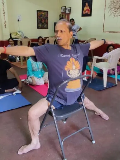 A seated pose on a chair.