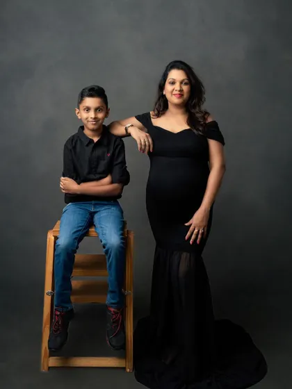 A powerful and loving portrait of a mother and her firstborn. This studio maternity shot beautifully captures the special bond they share before the new baby arrives.