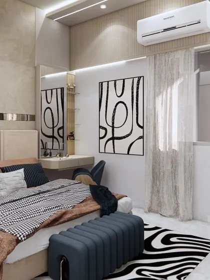 This view of the master bedroom showcases the balance between soft textures and bold patterns. The zebra-print rug adds a pop of contrast to the neutral color palette, while the wall paneling adds warmth and depth.