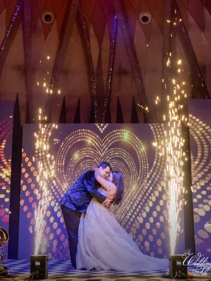 A grand finale to the couple's dance, with a romantic dip and a shower of cold pyrotechnics.