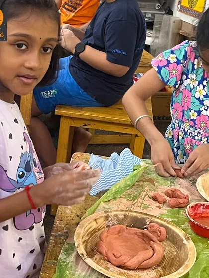 This student is focused on shaping her clay model. Hand-building with clay is a very grounding and sensory experience that many of our neurodiverse students find calming.
