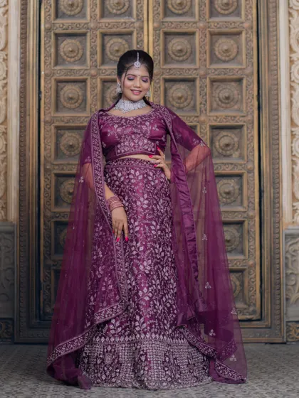 A full-length shot showing the details of the lehenga.