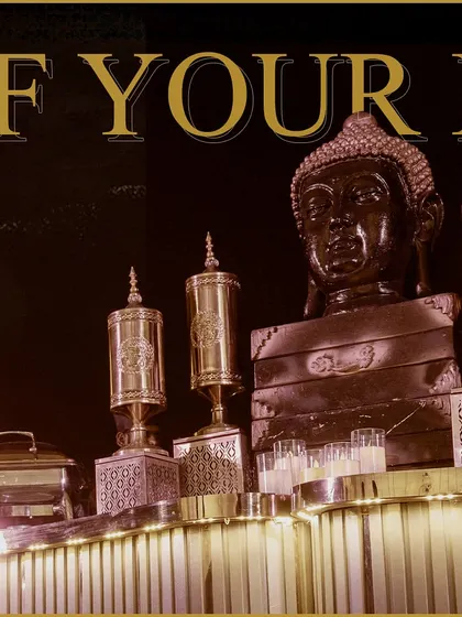 We incorporate thematic elements like this serene Buddha statue to align with your event's vision. The intricate brass decor adds a touch of traditional grandeur to the buffet line.