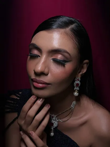 This angle showcases the smooth, airbrushed quality of the skin and the subtle contouring that defines the face.