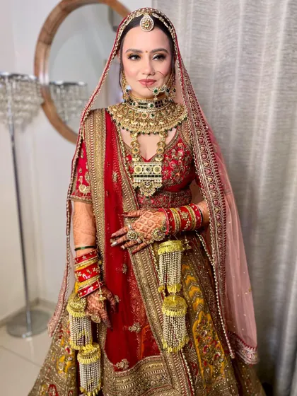 The complete look for my stunning Rajasthani bride. The makeup is rich and colorful, matching the grandeur of her traditional attire and jewelry.