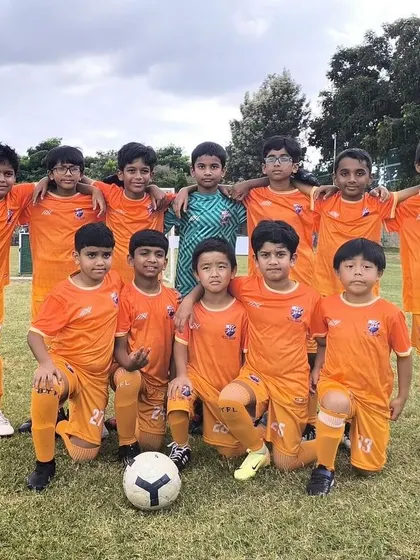 The U11 Blues team posing for a photo before their KSFA league match.