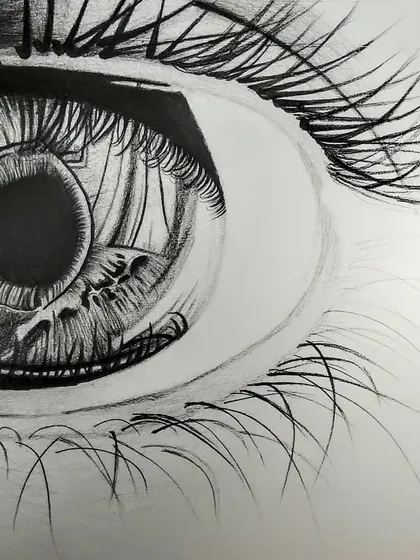 A practice sketch focusing on the details of an eye using charcoal and shading pencils. The reflection in the pupil was a great challenge to capture the sense of life and depth.