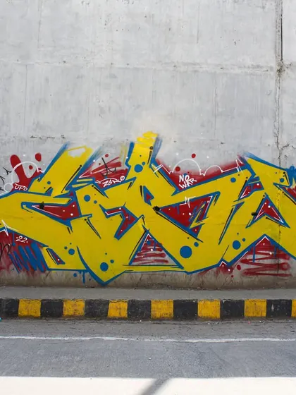 A full shot of my "No War" piece, combining wildstyle lettering with a message. The yellow, red, and blue color scheme is a nod to the cause.