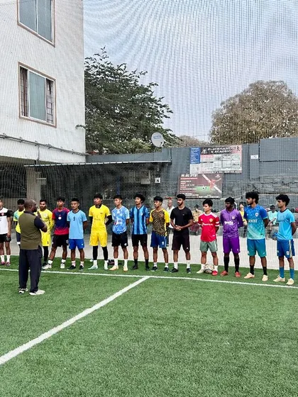 Passion meets strength. A coach briefs the team, instilling the mindset and strategy needed to take on any challenge and let their dreams take flight.