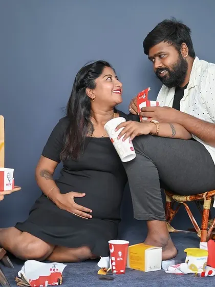 Sharing a fun moment with their favorite snacks, this maternity shoot is all about celebrating the couple's personality and their journey together.