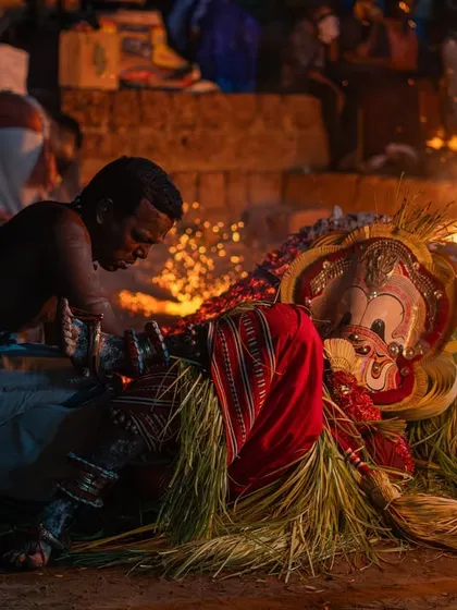 A series capturing the different stages of the Pottan Theyyam ritual, from the performer lying on the embers to being tended to by assistants. These images show the intensity and devotion involved in the all-night ceremony.