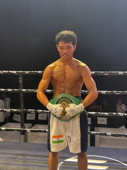 Posing with the belt. The culmination of months of hard work and dedication.