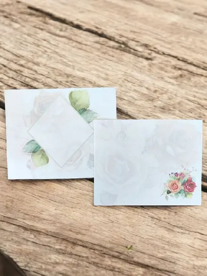 This delicate invitation features a soft watercolor rose design, offering a romantic and budget-friendly choice.