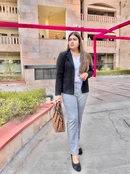 At Rohini Court with my swords at the ready. I am always prepared for litigation and to fight for my clients.