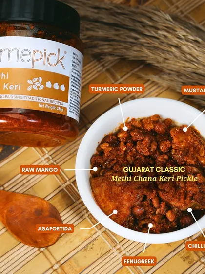 Our Methi Chana Keri pickle is a classic from Gujarat. It's a flavourful fusion of raw mangoes, soaked chana (chickpeas), fenugreek, and aromatic spices, offering a tangy, crunchy, and irresistible taste of tradition.