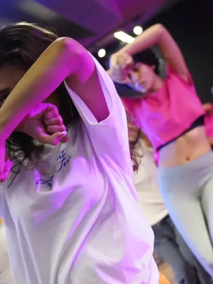 Dancers completely in the zone during an intensive choreography session.