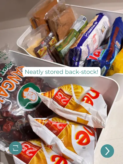 Neatly stored back-stock. We use open bins to hold extra packets of snacks and groceries, so you always know what you have.