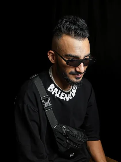 A candid style shot. The "Hate Less, Create More" mindset applies to everything, including how you carry yourself.