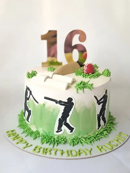 A cricket-themed cake for a 16th birthday. This design features silhouettes of players in action, along with a bat and ball.