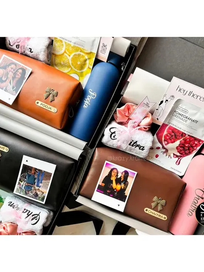 Thank you gifts for the bridesmaids! These hampers are personalized with their names on pouches and sippers, and filled with pampering goodies like face masks and towels.