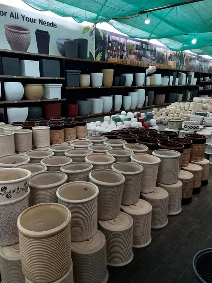 We have stacks of high-quality ceramic pots ready for your gardening needs. These are perfect for both indoor and outdoor plants.