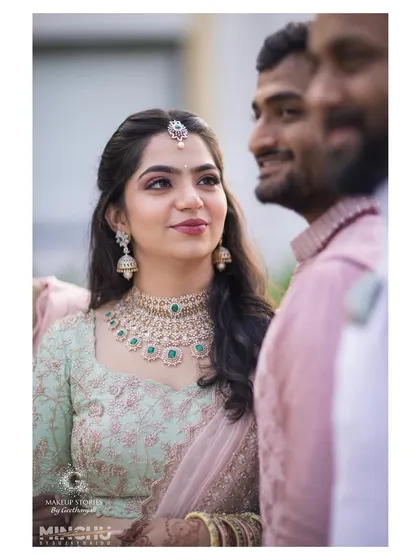 A lovely close up of Reshma. The makeup enhances her features with a soft, radiant glow, making her look effortlessly beautiful on her special day.