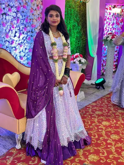 Another look at our happy client in her reception lehenga, a testament to how our rental outfits make special days perfect.