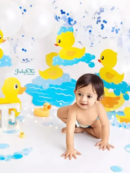 A happy crawler on his way to splash with the duckies. This theme is perfect for capturing the energy and smiles of a one-year-old.