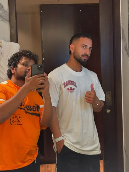 Getting Ramandeep Singh of KKR a sharp new look. This style is a clean buzz cut with a precise fade.