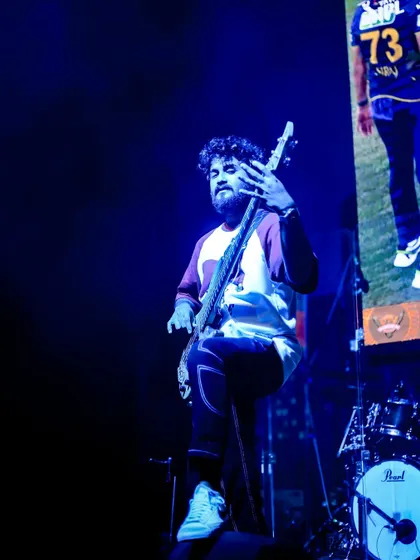 Bathed in blue light, our bassist creates a cool, intense atmosphere during a slower, more powerful moment in the set.