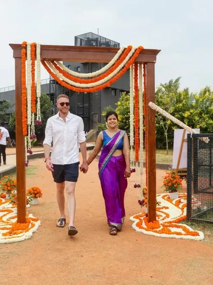 The sweet arrival of the couple for their Haldi ceremony. We created a simple yet beautiful floral archway to welcome Sonam and Ross to their outdoor celebration.