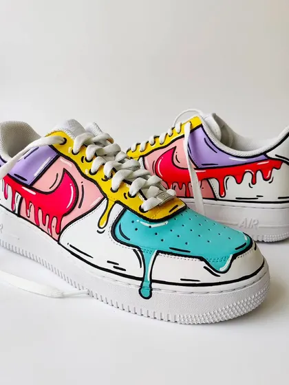 Another angle of the pastel drip sneakers. The black outlines make the colours pop and give it that cool, animated feel.